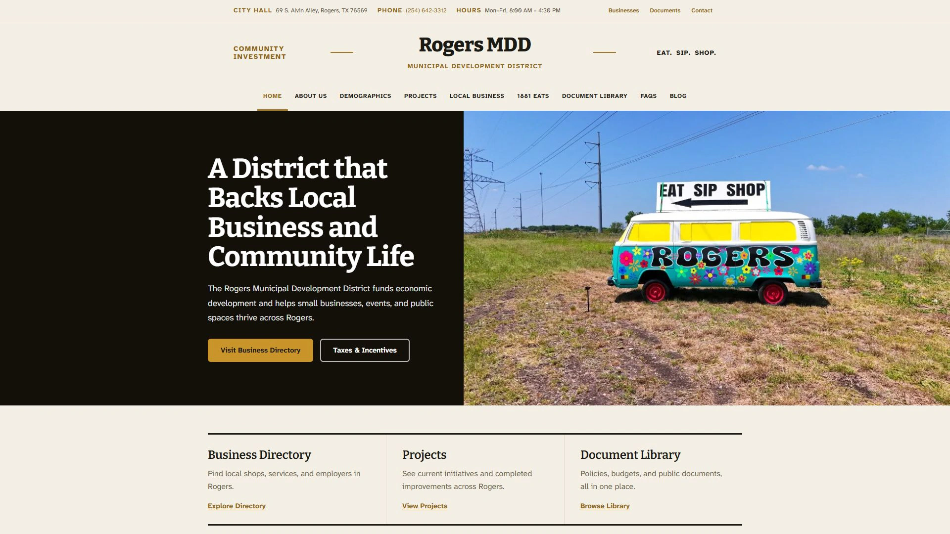 Rogers MDD: Split home hero with painted Rogers Eats, Sip, Shop bus and two primary calls to action